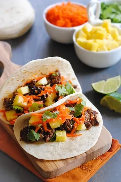 Asian Short Rib Tacos with Pineapple and Crunchy Slaw