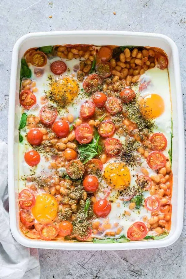Beanz baked eggs with spinach and tomatoes