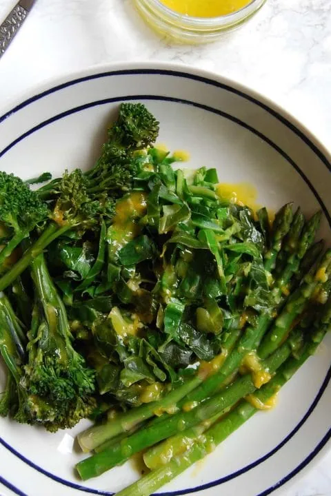 Spring greens with lemon and mustard dressing