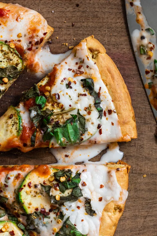 Zucchini pizza with basil and lemon