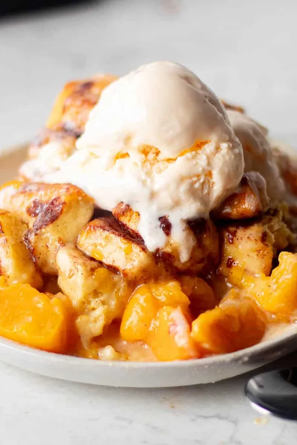 Cinnamon Rolls Peach Cobbler Recipe - Easy to Make!