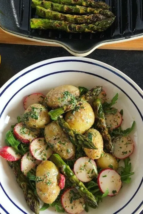 New potato salad with asparagus and radishes