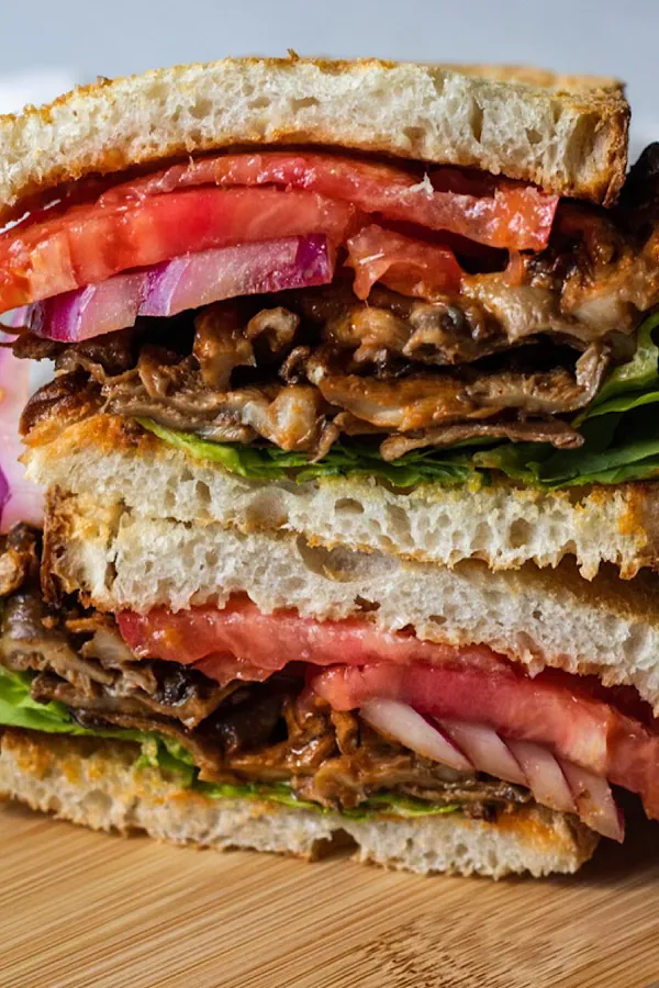 vegan buffalo chicken sandwich with oyster mushrooms